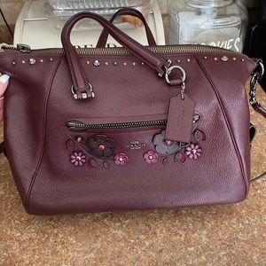 Purple flowered coach purse